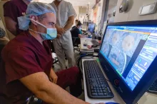 Brian Dlouhy performs a procedure on a pediatric epilepsy patient using the NeuroBlate Laser Interstitial Thermal Therapy System on Thursday, June 9, 2022. The LITT system uses MRI guided laser to destroy tissue in the brain. Image has been blurred.